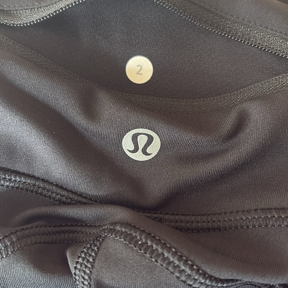 Lululemon ruffle at ankle leggings , black , size 2, length 35”